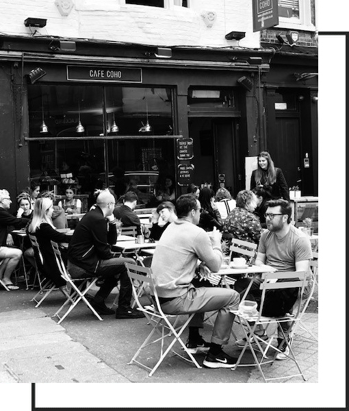Guests sitting outside Cafe Coho on Ship Street